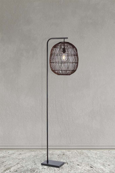 Rattan floor lamp in brown finish against grey background. 