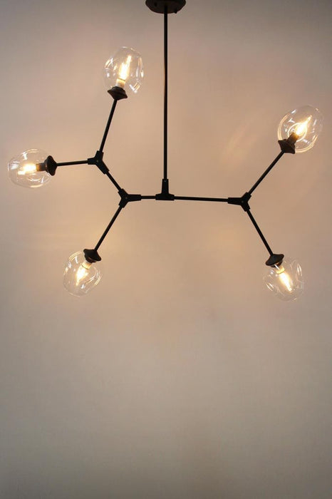 Five light chandelier spatial arrangement