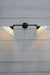 Double arm wall light with black finish and ceramic shades