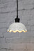 Frilled ceramic pendant with black cord