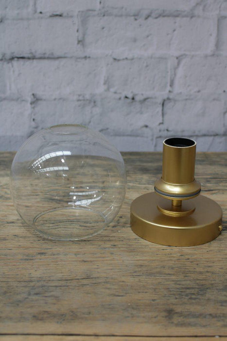 Clear glass shade and gold brass batten holder