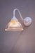 Glass wall light with white steel sconce