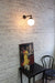 Glass ball wall light in vintage restaurant setting