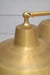 Gold/Brass steel frame wingnut close up with bright solid brass shade