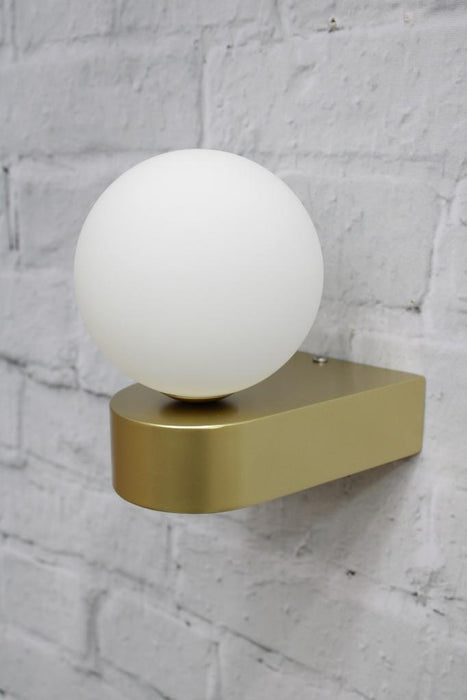 Gold and opal wall light unlit