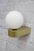 Gold and opal wall light unlit