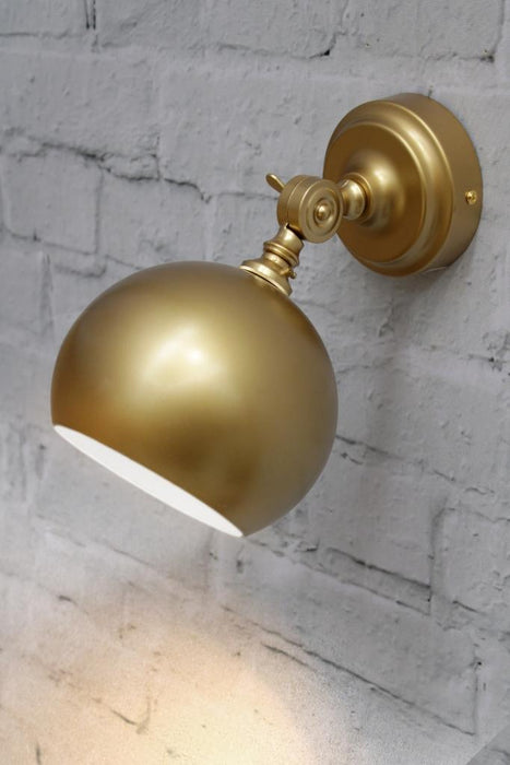 Gold brass adjustable wall light
