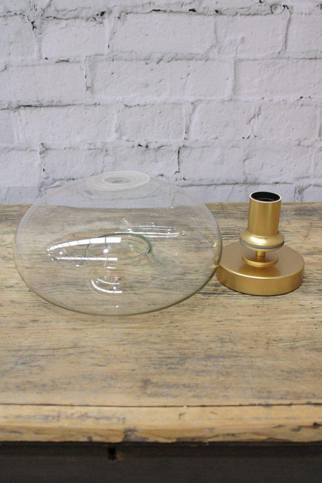 Oval glass shade and gold batten holder