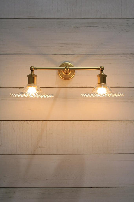 Gold wall light front view
