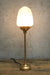 Table lamp with gold brass base and gallery