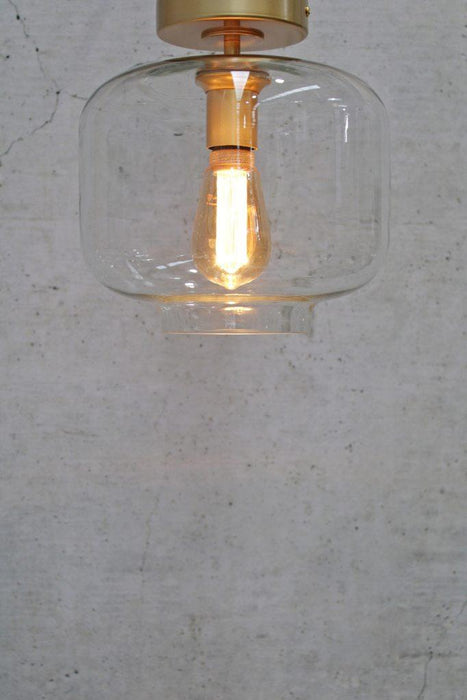 Gold clear glass flush mount with vintage bulb