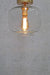 Gold clear glass flush mount with vintage bulb