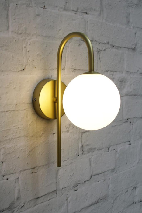 Opal glass wall light with gold sconce