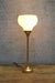 Gold table lamp with matching gallery