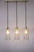 Gold three light pendant with long shade