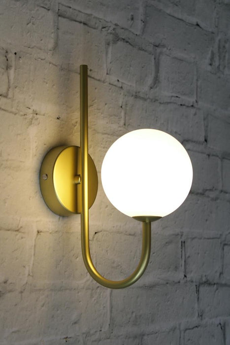 Gold wall light inverted