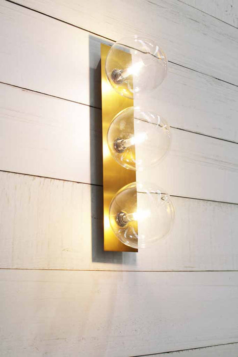 Gold brass wall light with clear shades