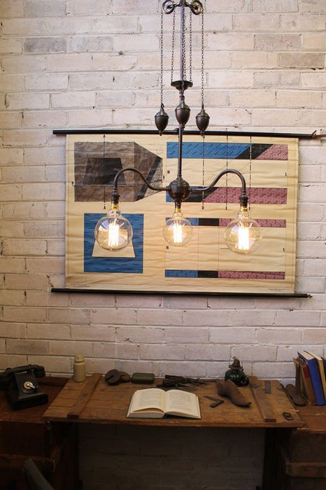 Gooseneck chandelier light used as home lighting with edison style bulbs