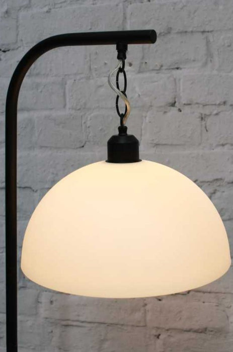 black floor lamp with opal glass dome shade