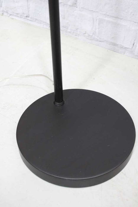 base of black floor lamp