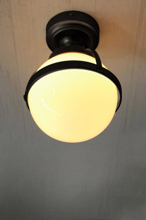 Huxley ceiling light in black finish with opal shade