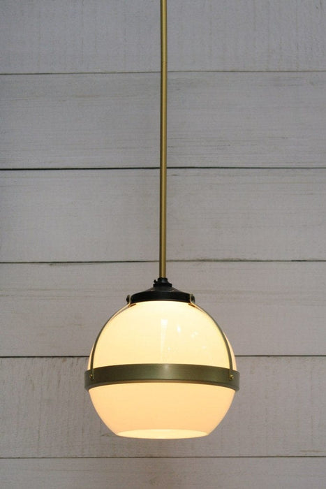 Huxley pendant with gold pole and medium open shade