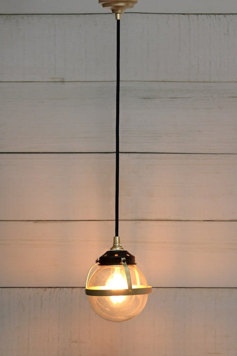 Huxley pendant with gold cord and small clear shade
