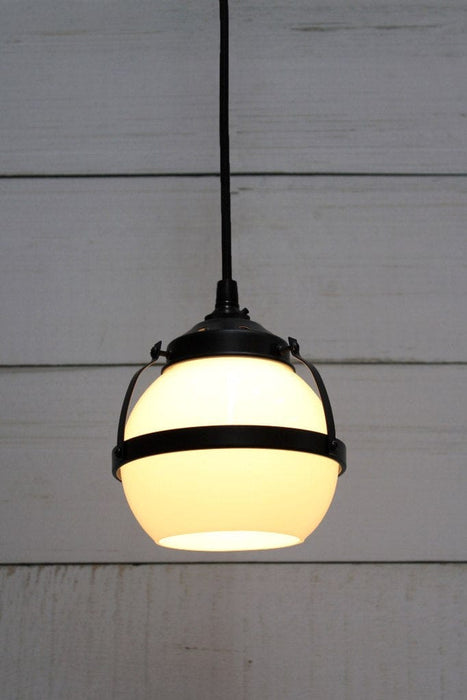 Huxley pendant with black cord and small open shade