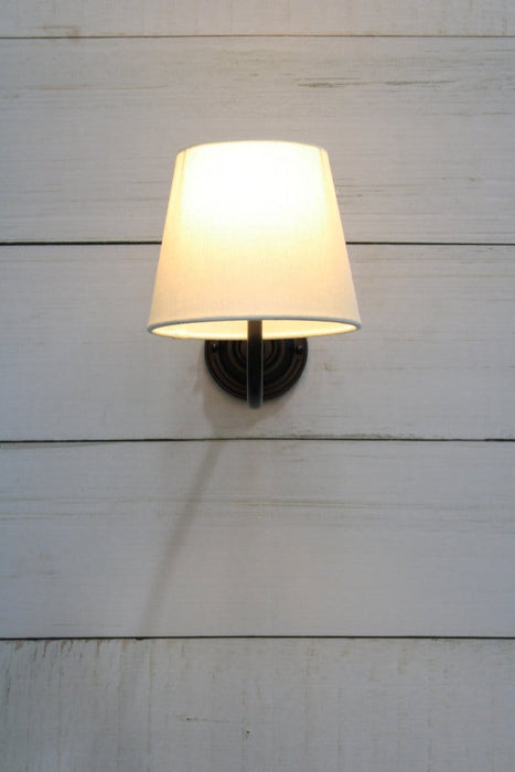 Black gooseneck wall light with white shade