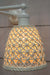 Close-up of detailing on tall Milan ceramic shade. 