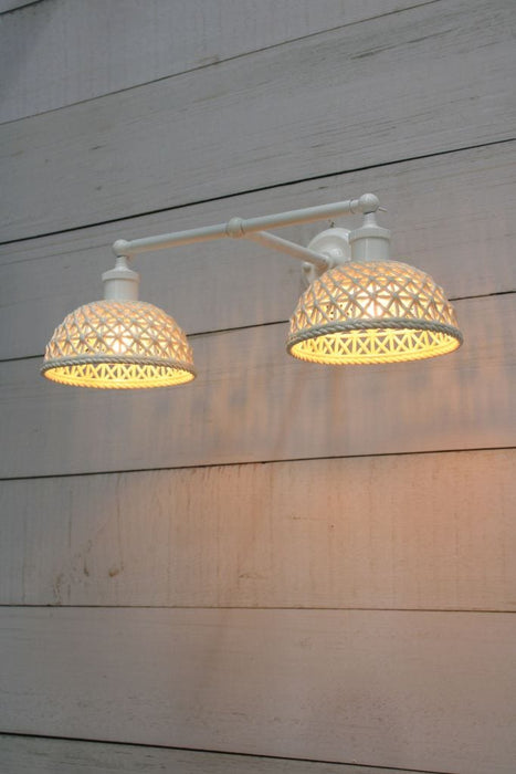 Side view of short Milan ceramic shades with white double swivel arm. 