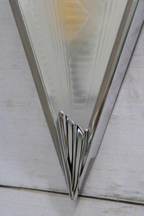 Close-up of chrome finish on Ritz Deco Glass Wall Light. 