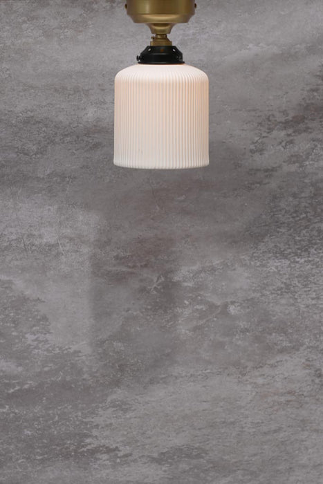 Ceramic flush mount light with gold/brass batten holder