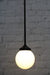 Junction light with C configuration and opal glass ball shade