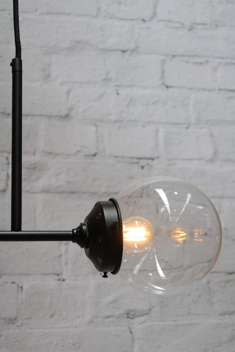 Clear glass ball shade on junction pendant light