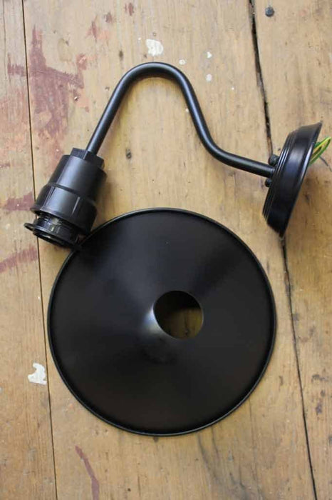 Industrial sign wall light has an e27 fitting