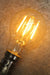 Led filament bulb a60 2w 2200k for festoon lighting table lamps floor lamps or pendant lights. not dimmable.