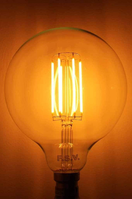 Led light bulb clear 125 5w 2200k with long led filaments. b025
