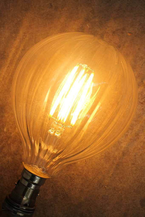 LED filament bulb. Dimmable LED Making it a great lighting solution for high end retail stores pubs and restaurants as well as beloved private spaces