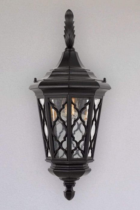 Lantern wall light with metal lacework