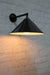 Large black cone wall light with black brass arm