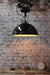 Large industrial scissor light. robust. black pendant light. a smooth glossy black outer finish and contrasting white inner. online lighting.