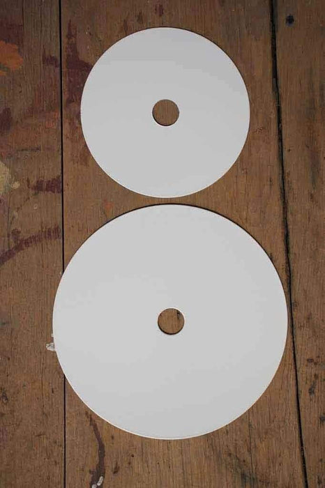 Large and small white discs