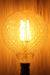 Lattice led filament bulb 125 6w. decorative vintage glass pattern. long led filaments. dimmable. lifespan of 15 000 hours