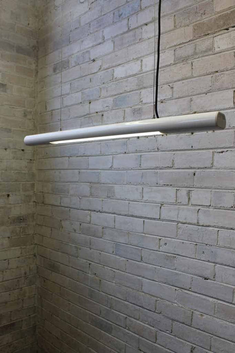 Linear light fluro light in matt white elegant fluorescent strip and cabels to suspend as a hanging light