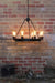 Lodge chandelier. rustic lighting with tear drop bulbs ideal to use over a table