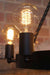 Lodge chandelier with spiral edison light bulbs ideal for ambient lighting