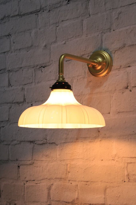 mayflower shade on a gold steel 90 degree sconce arm