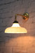 mayflower shade on a gold steel 90 degree sconce arm