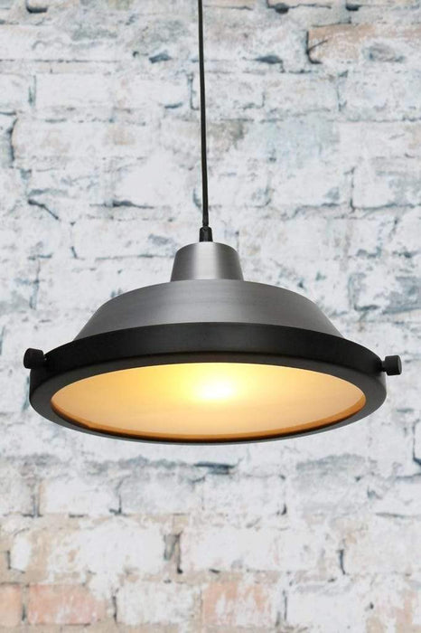Modern pendant light with steel shade and glass cover